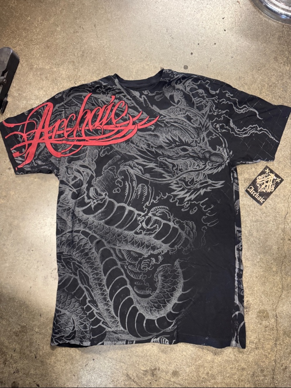 Archaic NWT T-shirt Wrap Around Design. Size XL from Zumies or Tillys